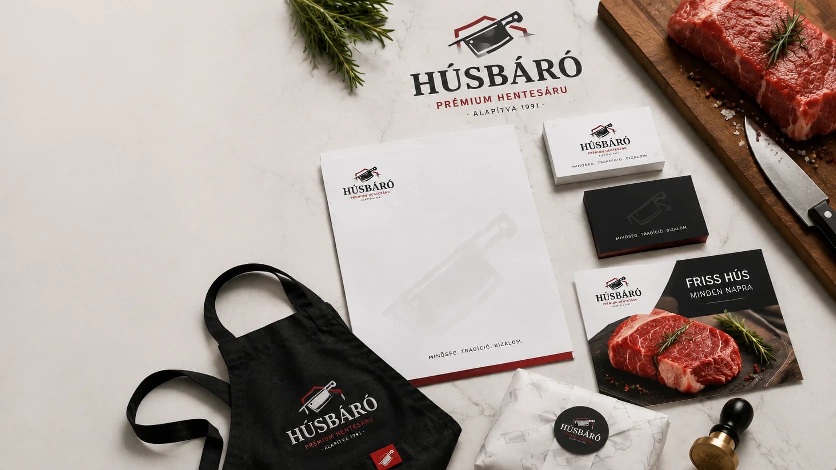 Húsbáró prémium hentes-arculat — logó, papíráru, csomagolás, kötény